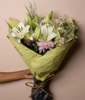 Gift your loved ones a beautiful bunch including lilies, chrysanthemums, wildflowers, and foliage