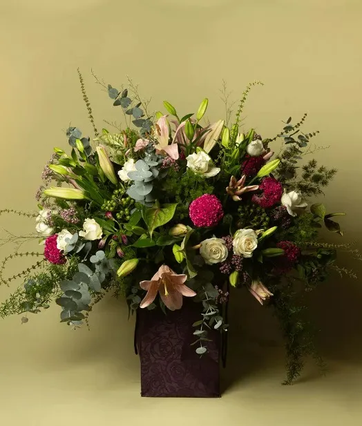Gift your loved ones a beautiful, colorful large flower arrangement in a printed box to show you care.