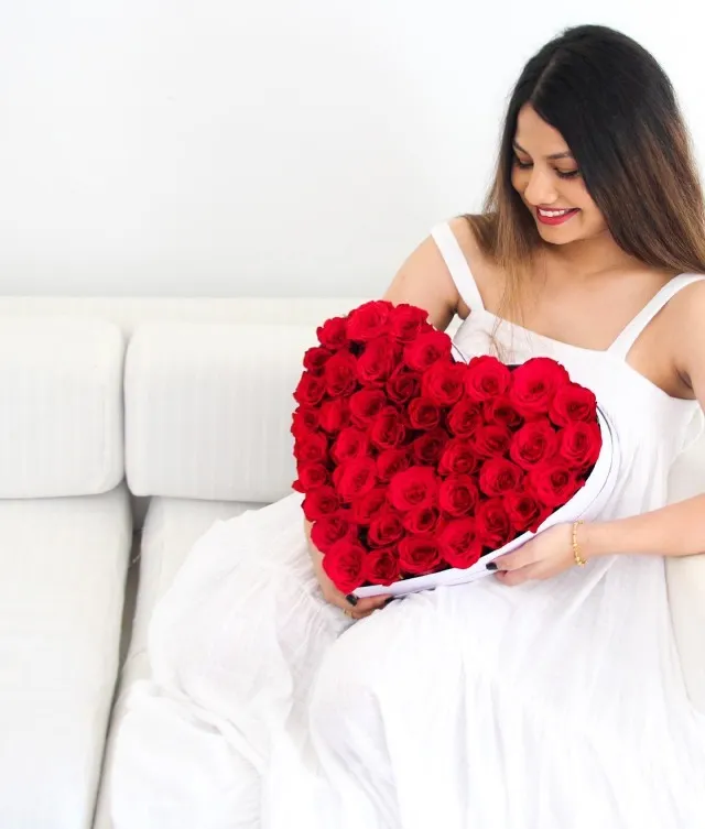 Gift your loved one 50 red roses in a heart-shaped box