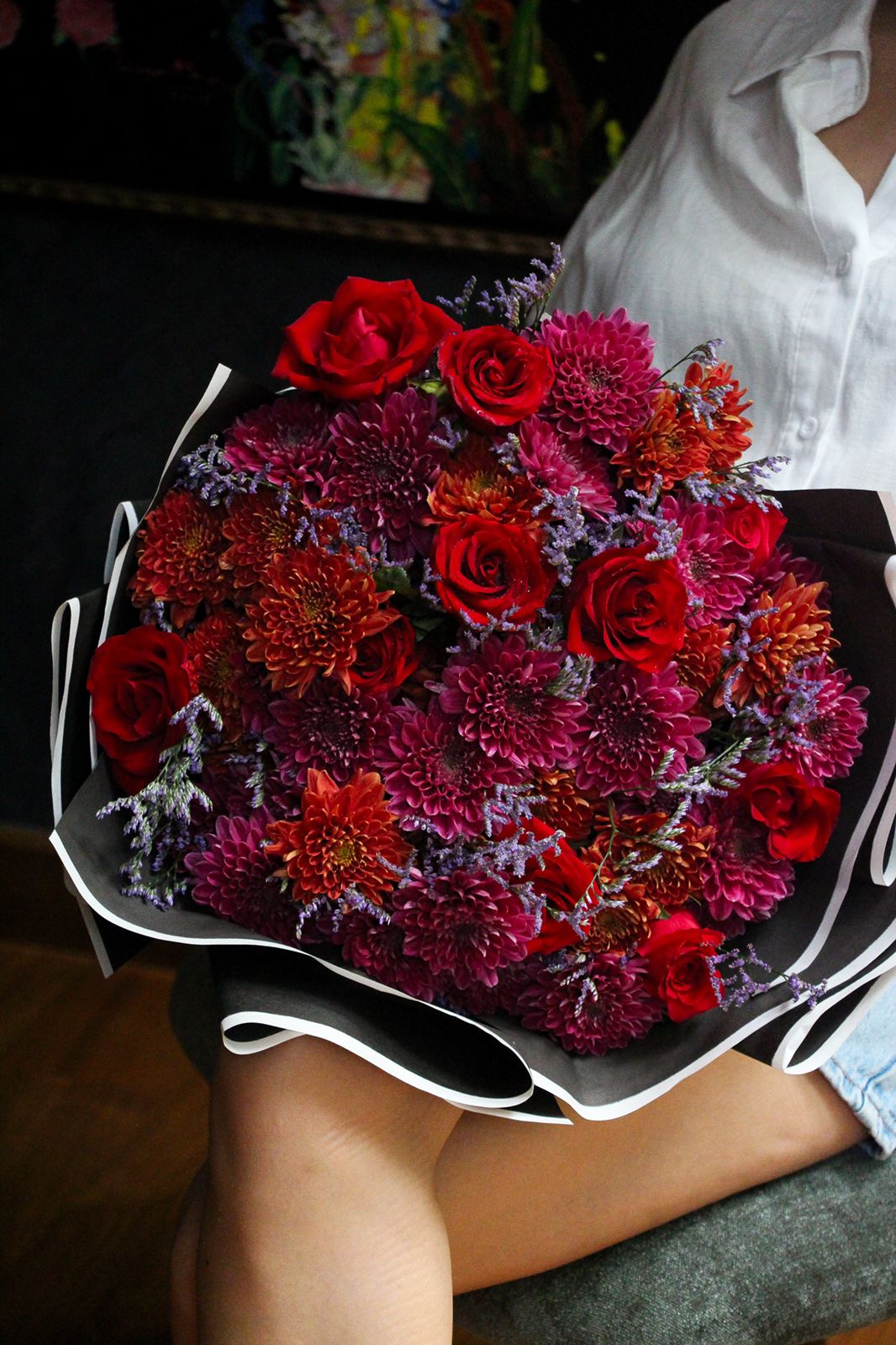 Give your loved ones a beautiful flower bouquet, with red roses and chrysanthemum including wrapping.