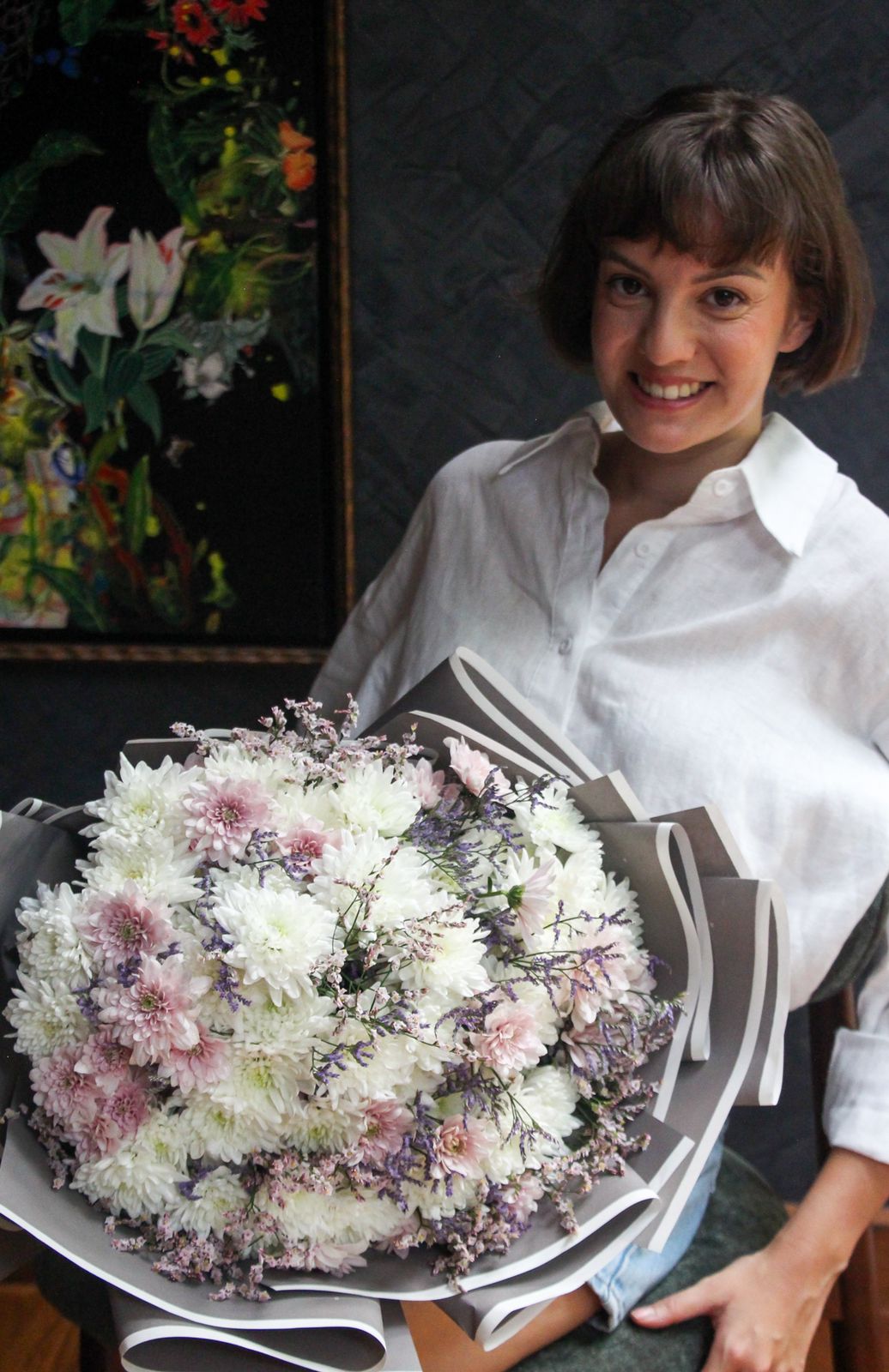 Give your loved ones a beautiful flower bouquet in white chrysanthemum and roses , including wrapping.