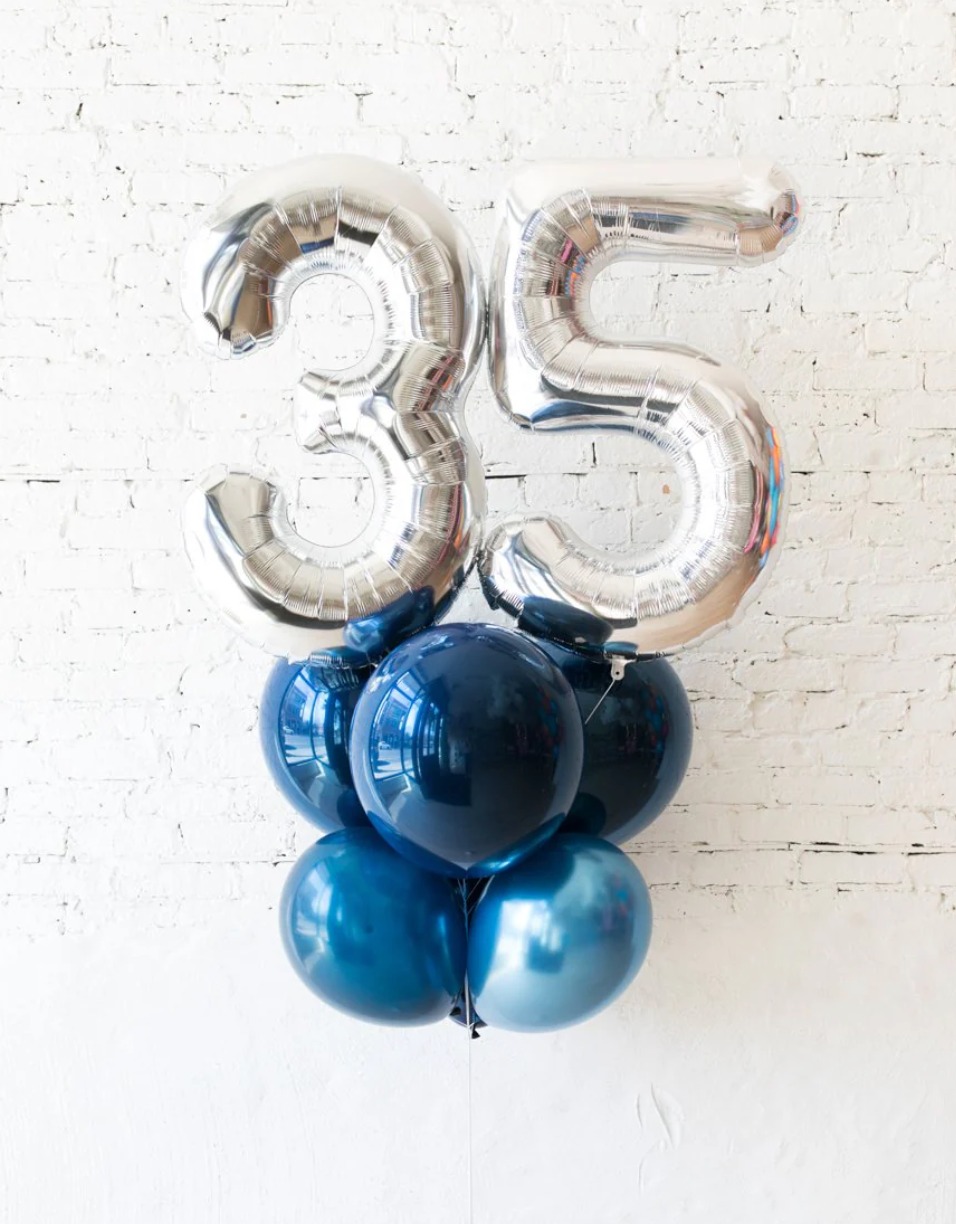 This arrangement includes one giant number balloon and five helium latex balloons. The color theme and number can be customized to your preference.
