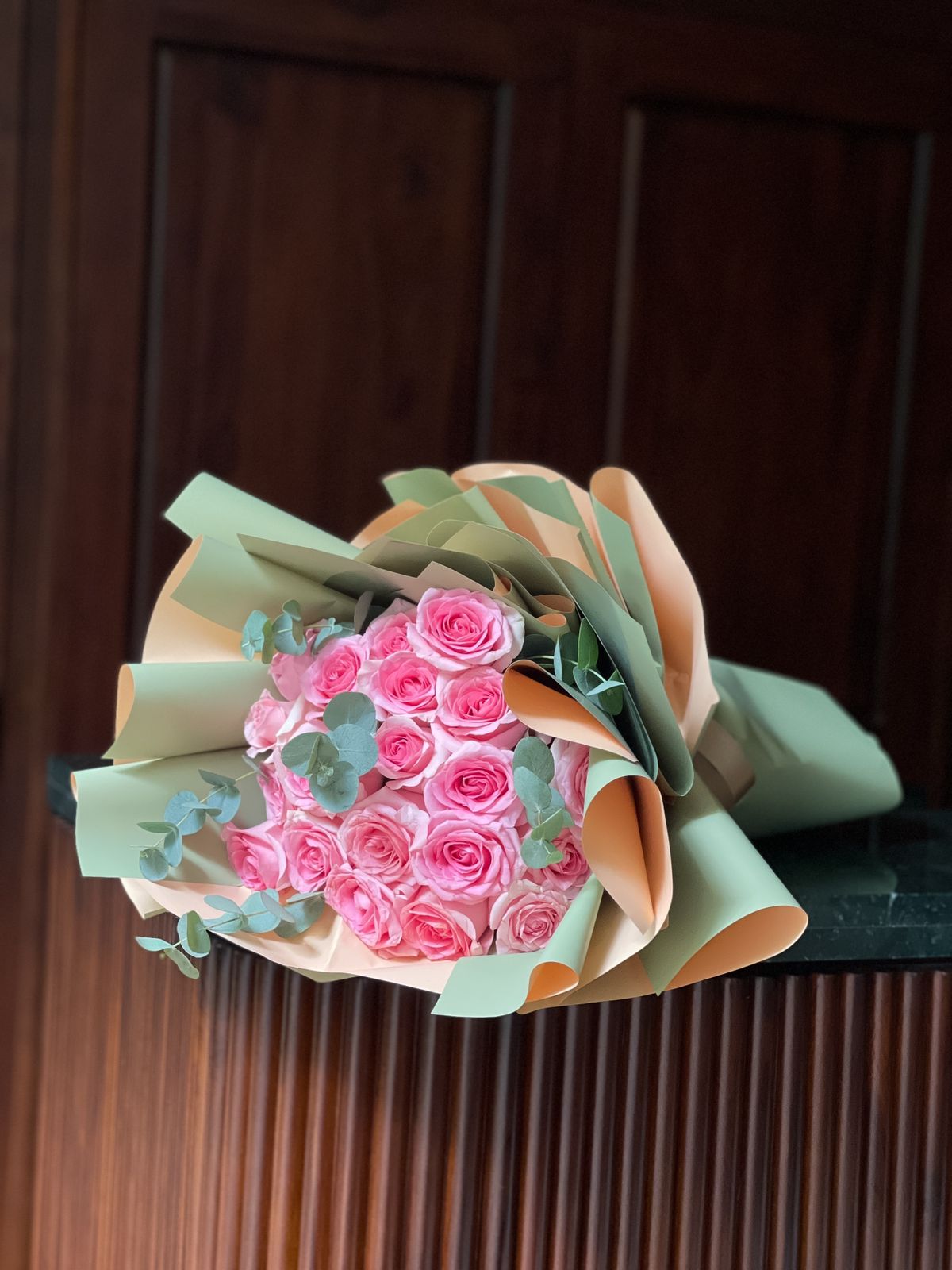 Surprise your loved ones with a breathtaking bouquet of 20 baby pink roses, elegantly wrapped in a delicate two-tone paper. A timeless expression of love and affection, this exquisite arrangement is thoughtfully crafted to brighten their day and leave a lasting impression.