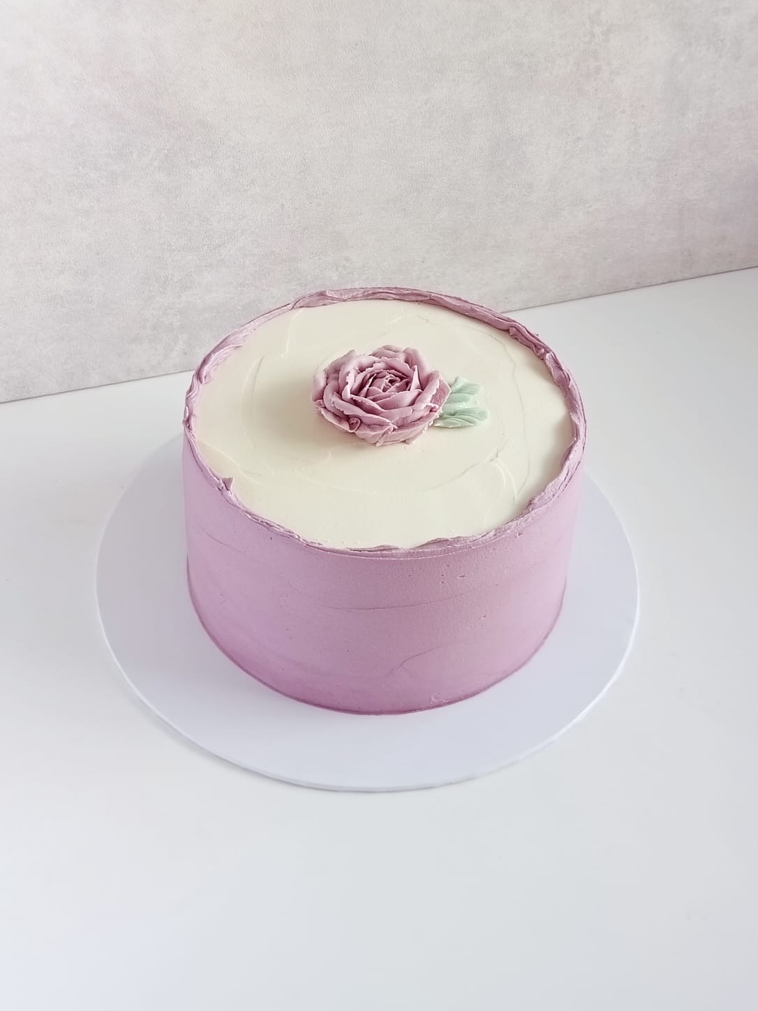 Please note the flavor profile of your choice at checkout: Classic Vanilla or dark Chocolate. The cake has dimensions of 6 inches in diameter and 3-4 inches in height