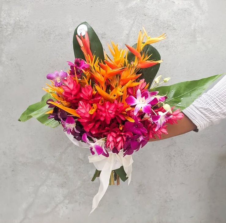 a vibrant tropical flower bouquet. A stunning expression of warmth, joy, and tropical elegance