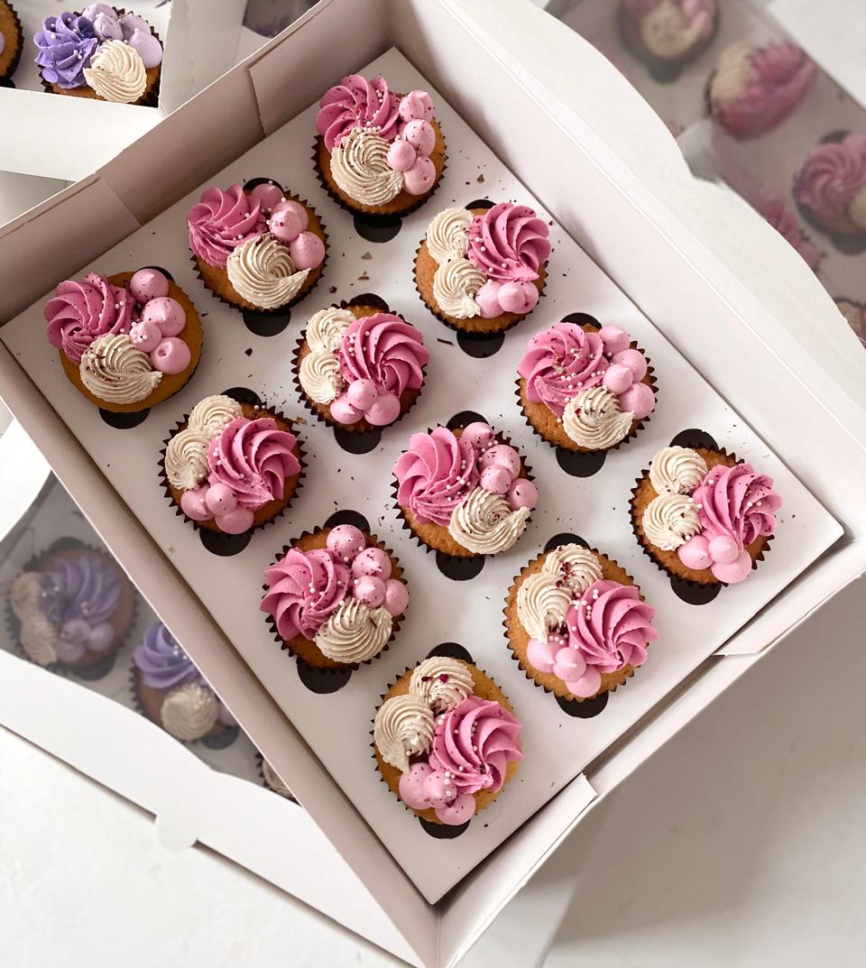 12 delicious cupcakes box in pink and white colors