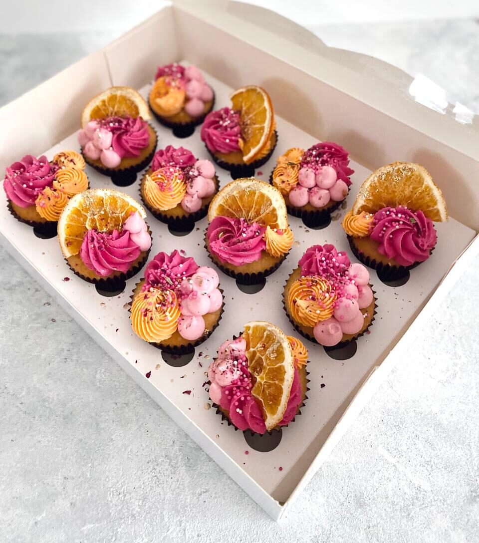 12 delicious cupcakes in pink color with dried lemon